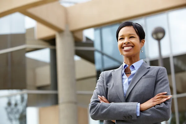 Confident Businesswoman with crossed hands — Stock Photo, Image