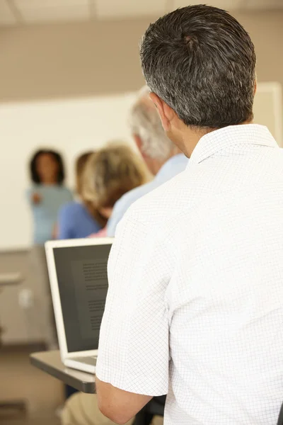 Mature student in class — Stock Photo, Image