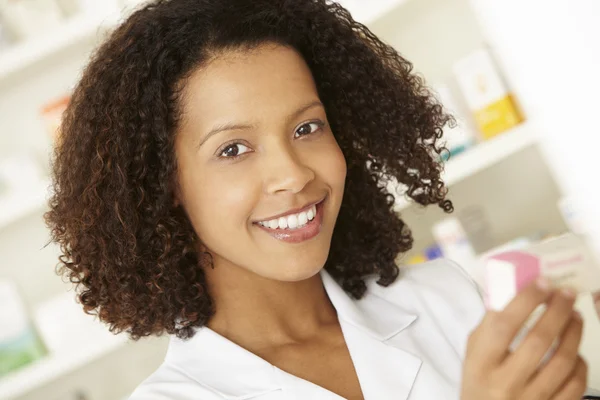 Female nurse in pharmacy — Stock Photo, Image