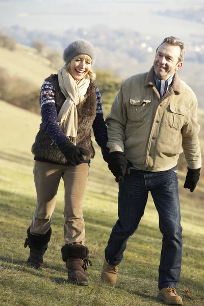 Mature couple on country walk — Stock Photo, Image