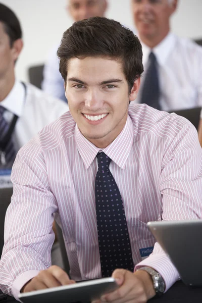 Delegate Listening To Presentation At Conference — Stockfoto