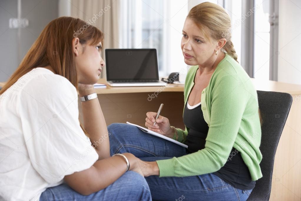 depositphotos_102743124-stock-photo-young-woman-having-counselling-session.jpg