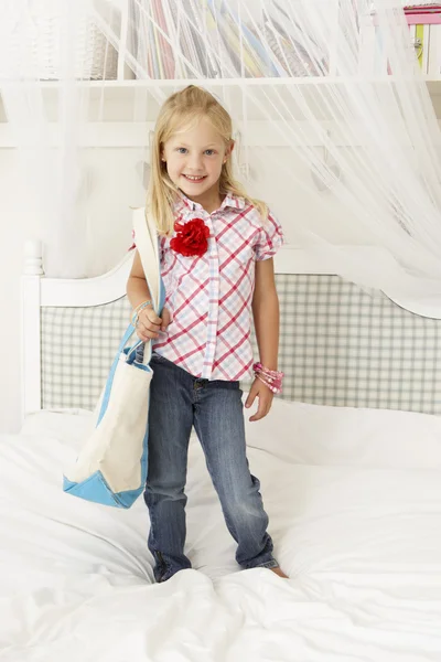 Young Girl Dressing Up In Bedroom — Stock fotografie