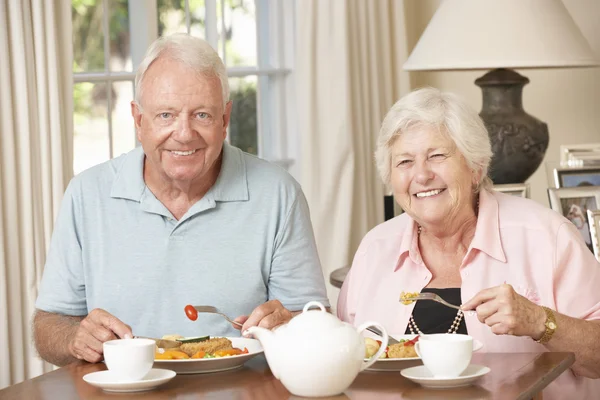 Senior Couple Enjoying Meal Together Royalty Free Stock Images