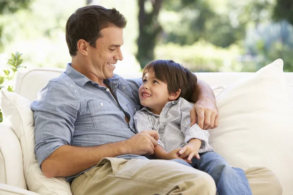 Father And Son Sitting On Sofa — Stock Photo, Image