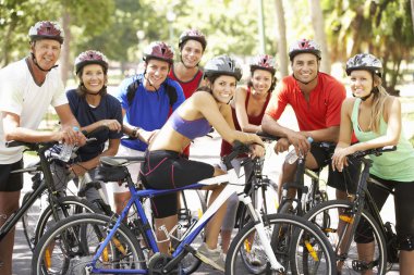 Cyclists Resting During Cycle Ride clipart