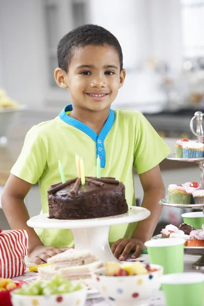 Young Boy With Birthday Party Food — ストック写真