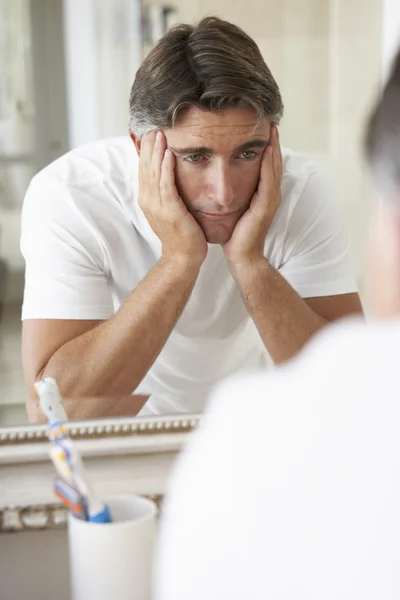 Unhappy Man Looking At In Mirror — Stock Photo, Image