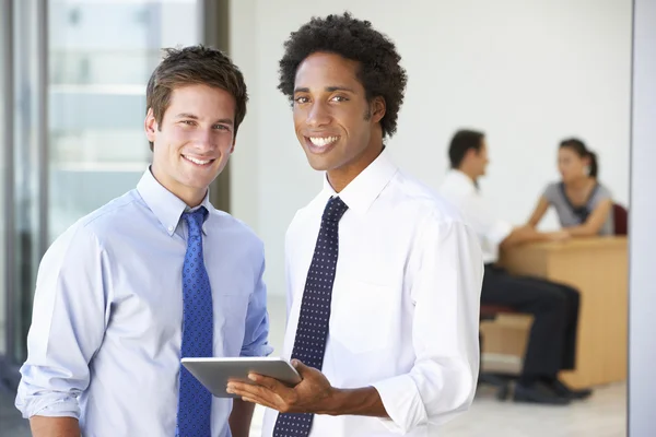 Executives Using Digital Tablet — Stock Photo, Image