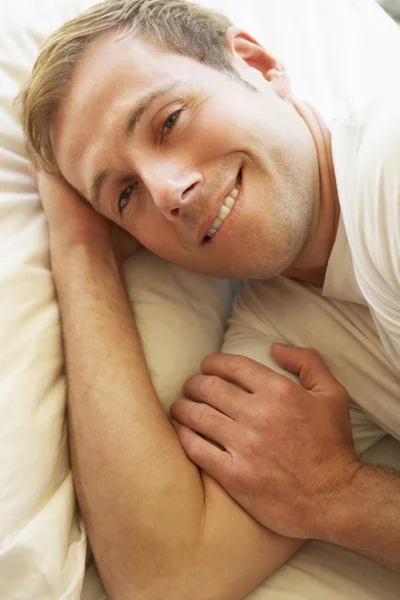 Man Relaxing In Bed — Stock Photo, Image