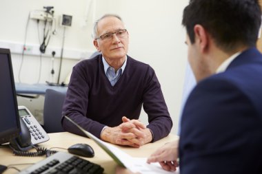 Consultant Discussing Test Results With Patient clipart