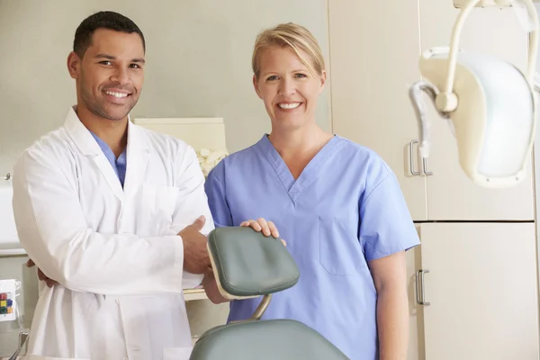 Dentist And Dental Nurse In Surgery — Stock Photo, Image