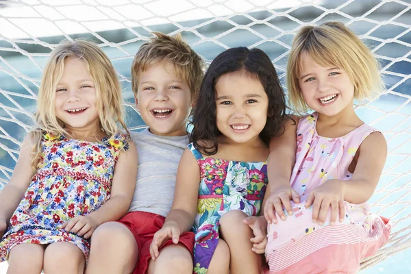 Children Relaxing In Garden Hammock — Stock Photo, Image