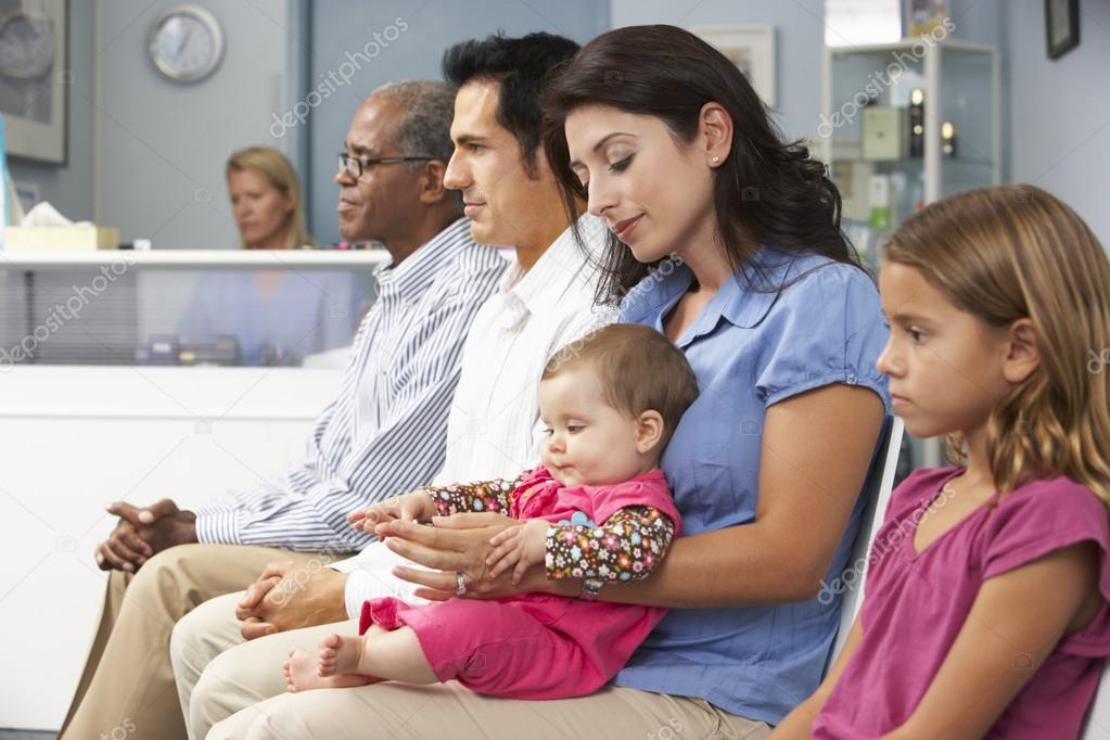 Patients In Doctor's Waiting Room — Stock Photo © monkeybusiness 102780176