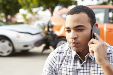 Driver Making Phone Call After Accident clipart