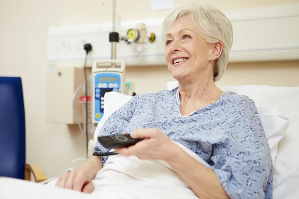 Senior Patient Watching TV In Bed — Stock Photo, Image