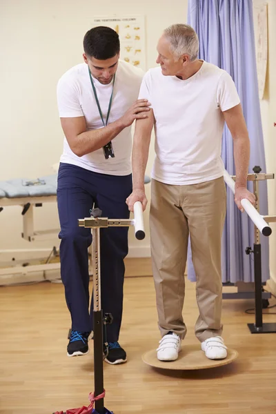 Senior Patient Having Physiotherapy In Hospital — Stock Photo, Image