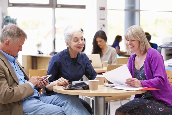 Mature Students Collaborating On Project Together — Stock Photo, Image