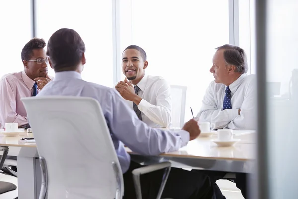 Businessmen on Meeting Around Boardroom Table — Stock Photo, Image