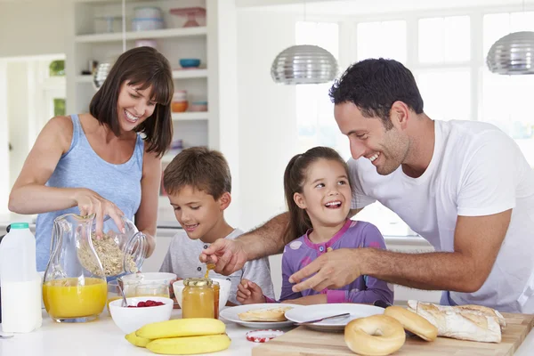 Family Making Breakfast In Kitchen — Stock Photo, Image