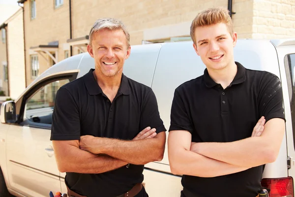 Young and a middle aged tradesmen — Stock Photo, Image