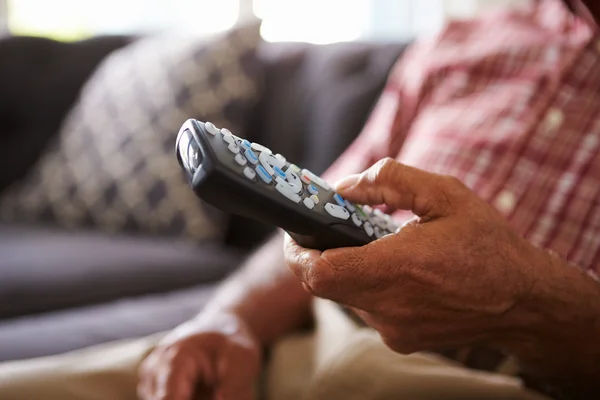 Senior Man Holding TV Remote — Stock Photo, Image