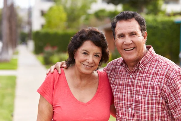 Senior Couple Walking Along Sidewalk — Stock Photo, Image