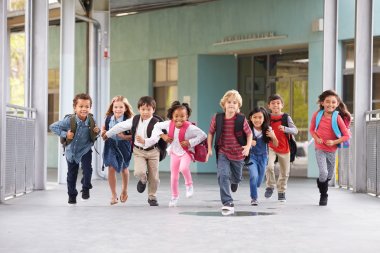 Kids running in a school corridor clipart