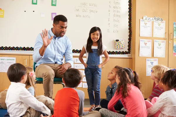 Schoolgirl at front of elementary class