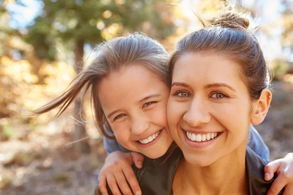 Woman With Younger Sister In Woodland — Stock Photo, Image