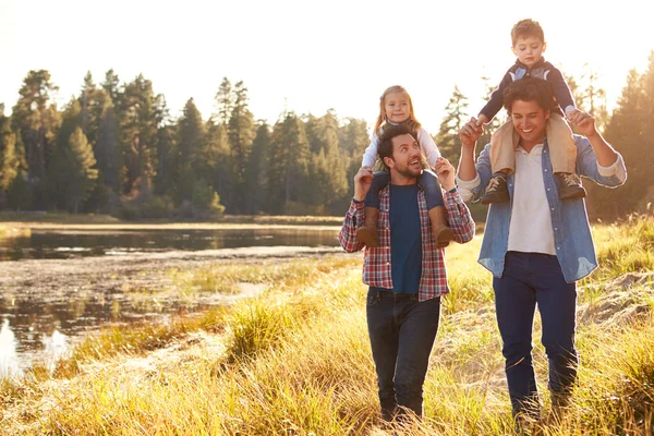 Male Couple With Children Walking By Lake — Stock Photo, Image