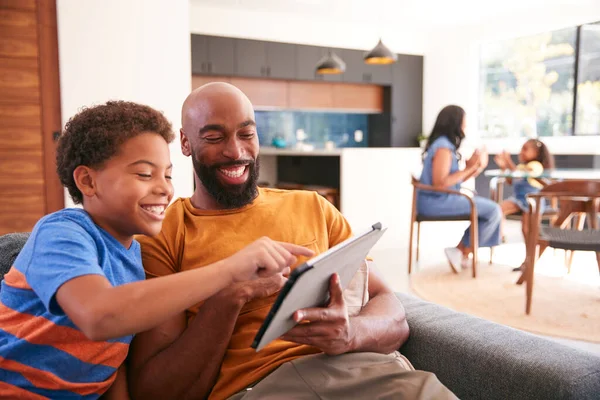 African American Family Home Father Son Sitting Sofa Home Using — 스톡 사진