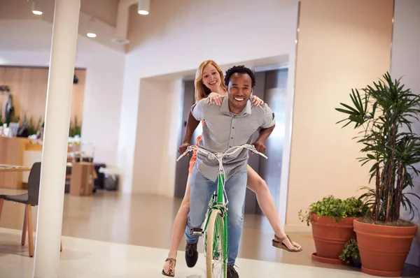 Businessman Businesswoman Having Fun Riding Bike Office — 스톡 사진