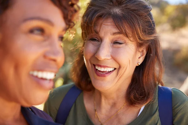 Two Senior Female Friends Hiking Trail Countryside Together — Stock Photo, Image
