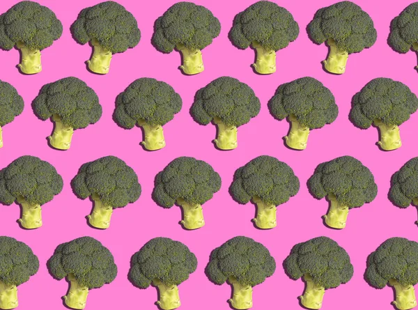 Grafische Achtergrond Patroon Van Broccoli Tegen Roze Achtergrond — Stockfoto