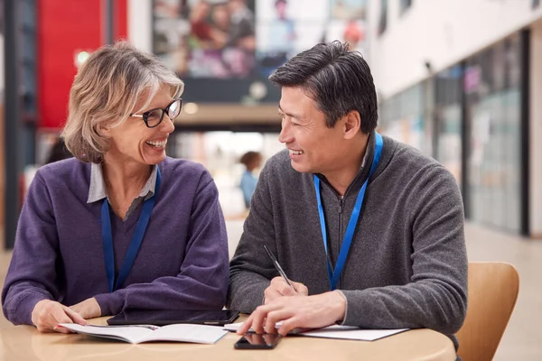 Teacher Mature Male Adult Student Sitting Table Working College Hall — Stock Photo, Image