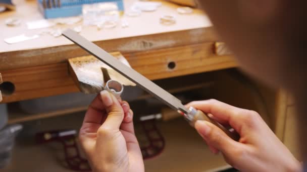 Close Female Jeweller Working Ring File Studio — Stock Video
