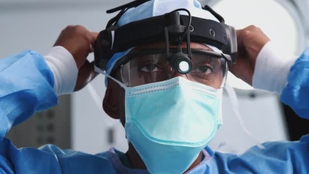 Male Surgeon Protective Glasses Head Torch Fastening Mask Hospital Operating — Stock Video