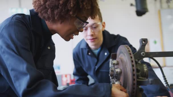 Tutor Female Student Checking Car Brake Disc Auto Mechanic Course — Stock Video