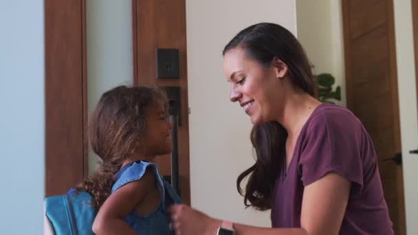 Mother Giving Daughter High Five She Leaves Home School Shot — Stock Video