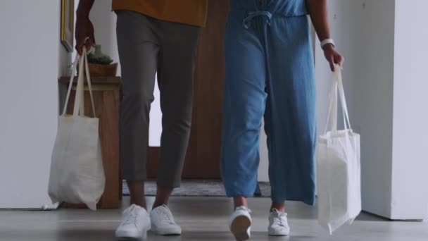 Close Couple Carrying Reusable Cotton Shopping Bags Retuning Home Shot — Stock Video