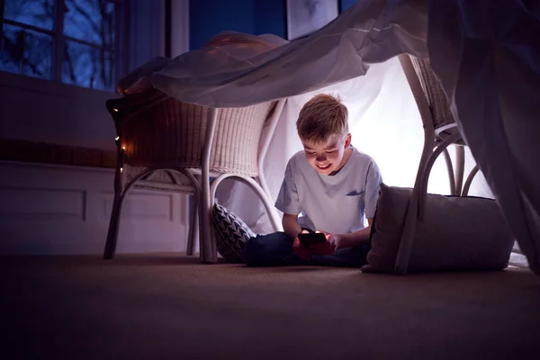 Boy Sitting Den Camp Has Made Home Playing Mobile Phone — Stock Photo, Image