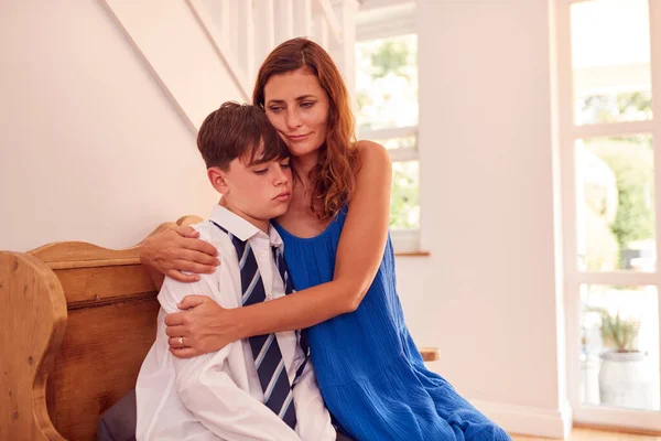 Mother Comforting Unhappy Bullied Son Wearing Uniform Leaves Home School — Stock Photo, Image