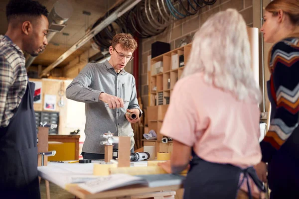 Multi Cultural Team Workshop Assembling Hand Built Sustainable Bamboo Bicycle — Stock Photo, Image