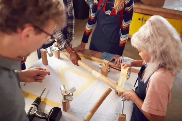 Multi Cultural Team Workshop Assembling Hand Built Sustainable Bamboo Bicycle — Stock Photo, Image