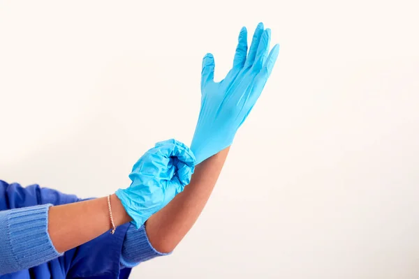 Close Female Nurse Wearing Scrubs Putting Sterile Ppe Gloves — Stock Photo, Image