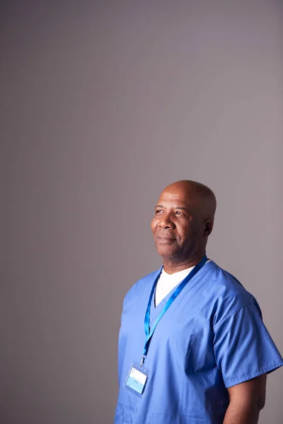 Portrait Male Nurse Wearing Scrubs Standing Grey Background — Stok Foto