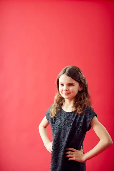 Portrait Girl Red Studio Background Smiling Camera — Stock Photo, Image