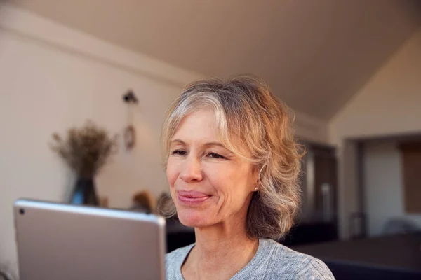 Close Smiling Mature Woman Home Using Digital Tablet — 스톡 사진