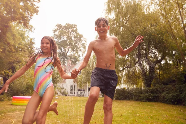 Children Wearing Swimming Costumes Having Fun Garden Playing Water Garden — Stock Photo, Image